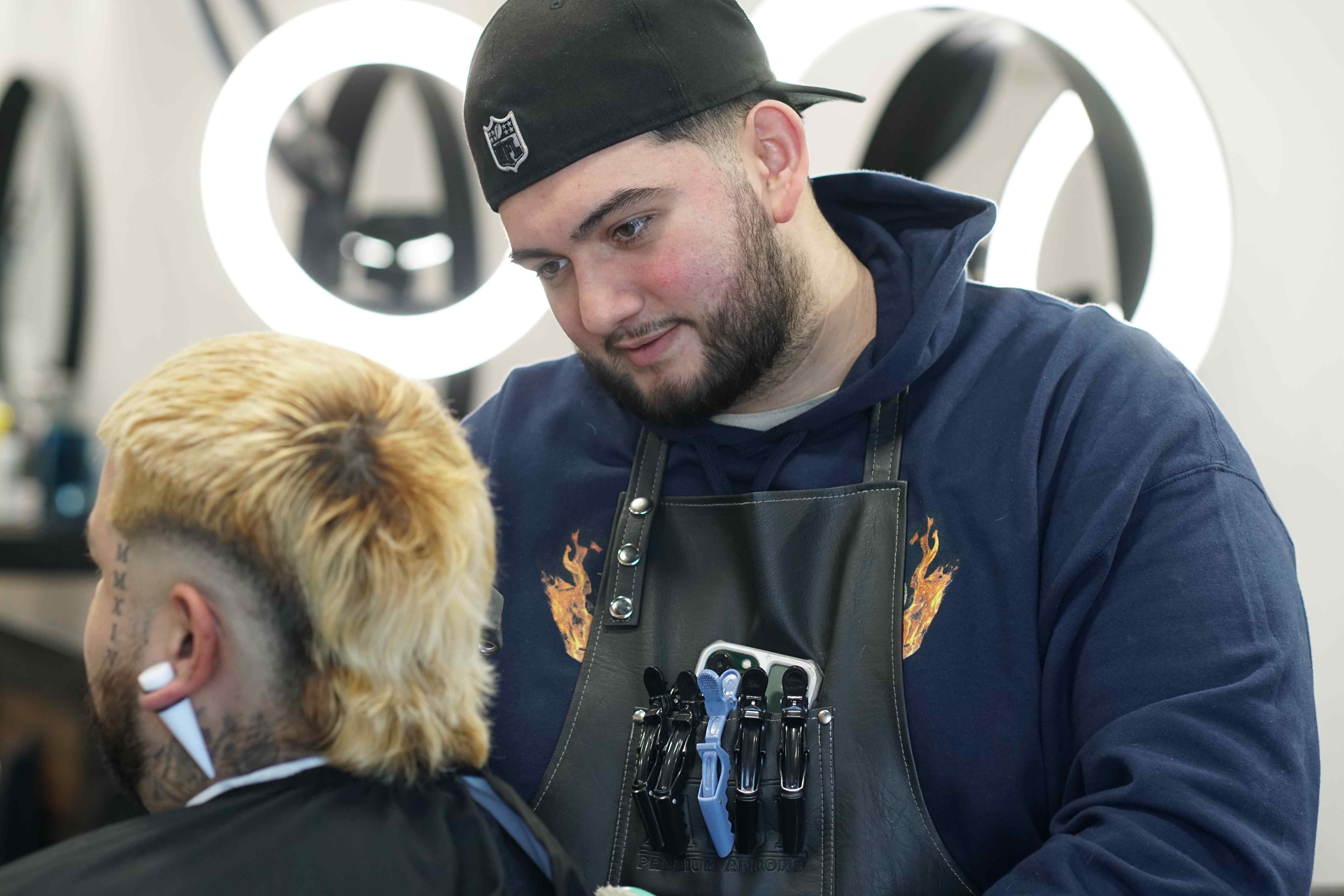 barber cutting hair