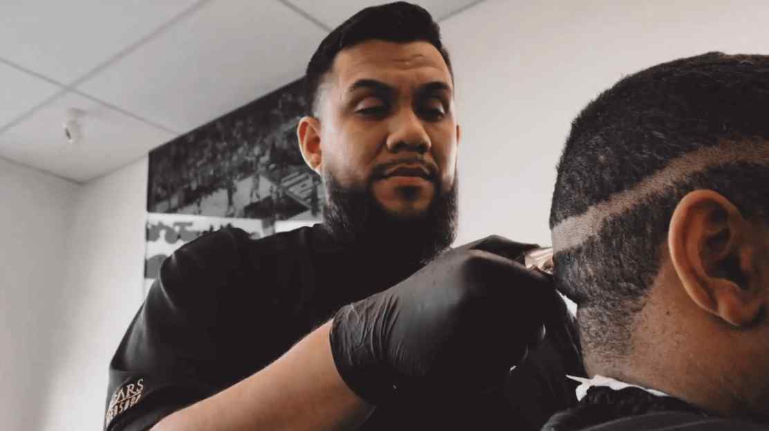 Barber cutting hair